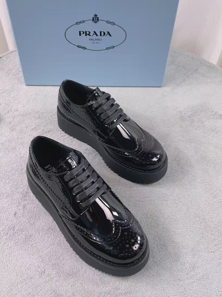 Prada Patent Leather Brogue Platform Derby Shoes